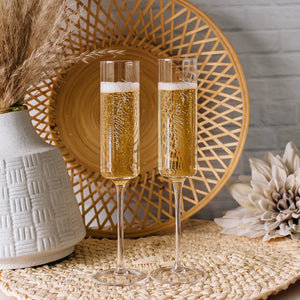 Engraving design options A to I for personalized Mr and Mrs champagne flutes
