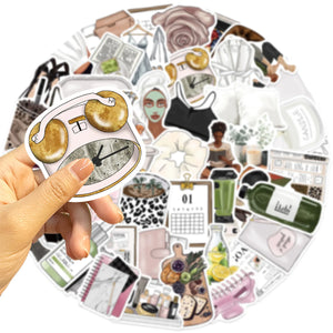 Hand holding a clean girl aesthetic sticker in front of a collage of neutral lifestyle stickers