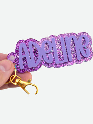 Colorful personalized name keychains in acrylic with shiny glitter finish