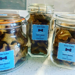 Custom logo stickers applied on gift bags and boxes for premium event packaging