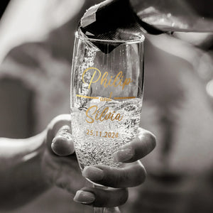 Close up of engraved name on champagne glass