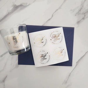 Gold foil clear thank you sticker used on gift packaging box