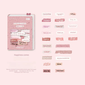 Pink vintage English label sticker pack showing “Happiness Comes” theme with assorted text labels on light pink background