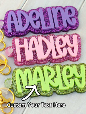 Personalized acrylic name keychain with glitter finish, laser engraved custom name design
File name: