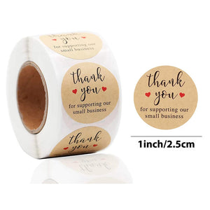 Round thank you stickers sealing envelopes and gift bags for weddings and special occasions