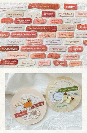 Flat lay of vintage English label stickers arranged on textured background