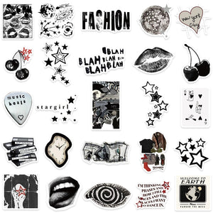 Close up of black and white cartoon stickers with bold lines and artistic patterns