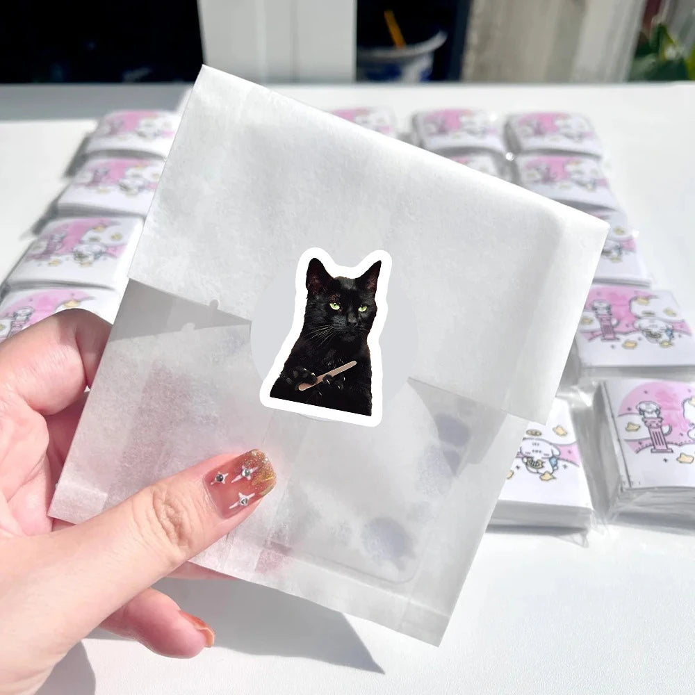 Close-up of cute cat meme stickers showing smooth finish and vibrant print quality