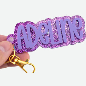 Colorful personalized name keychains in acrylic with shiny glitter finish