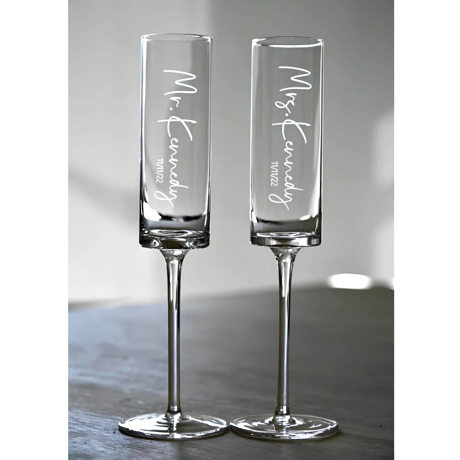 Custom laser engraved champagne glasses with personalized names