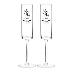 Custom name champagne flutes designed for wedding toasts