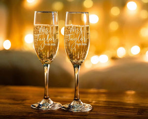 Champagne flutes engraved with custom names and wedding date