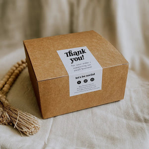 Custom wedding stickers used as elegant envelope seals for invitations and favors