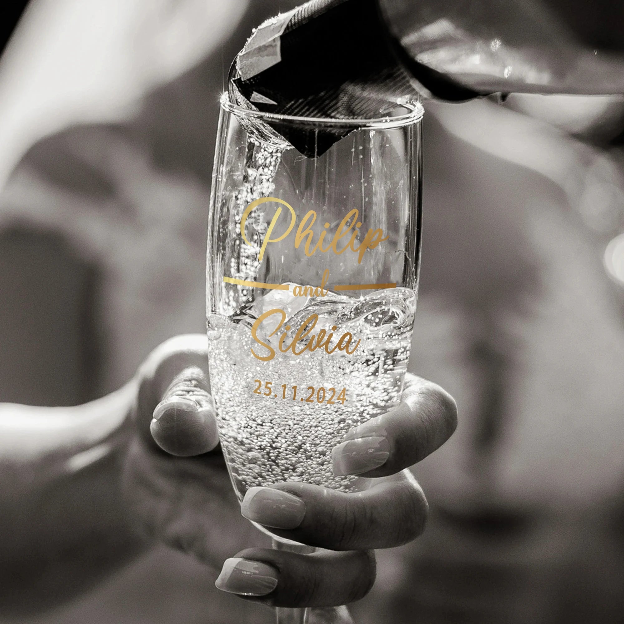 Close up of engraved name on champagne glass