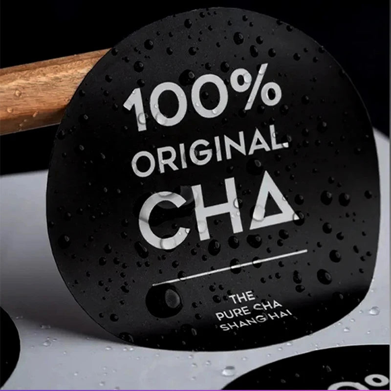 Close-up of glossy coating on custom logo sticker