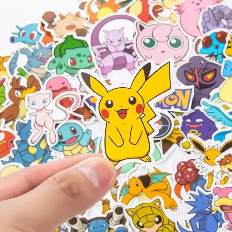 Close-up of cute kawaii stickers applied on a laptop surface