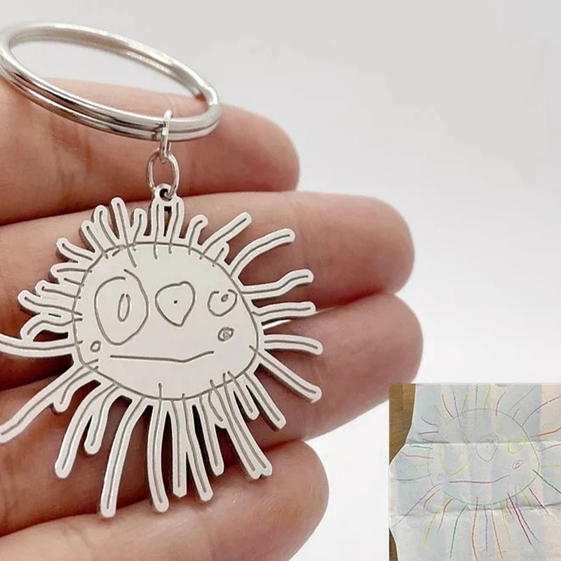 Custom stainless steel keychains created from children’s drawings and sketches