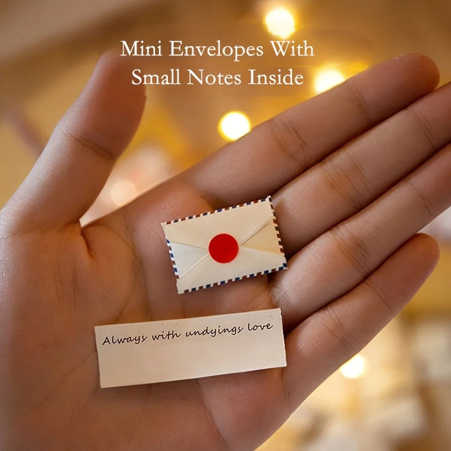 Close-up of mini paper envelopes with cute printed designs