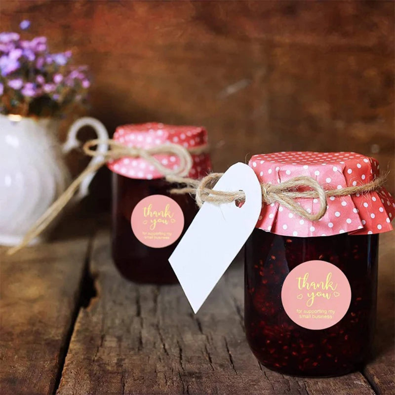 Round 1 inch thank you stickers with elegant floral design for gift wrapping and packaging