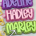 Personalized acrylic name keychain with glitter finish, laser engraved custom name design

File name: