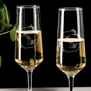 Personalized champagne flutes as an anniversary gift