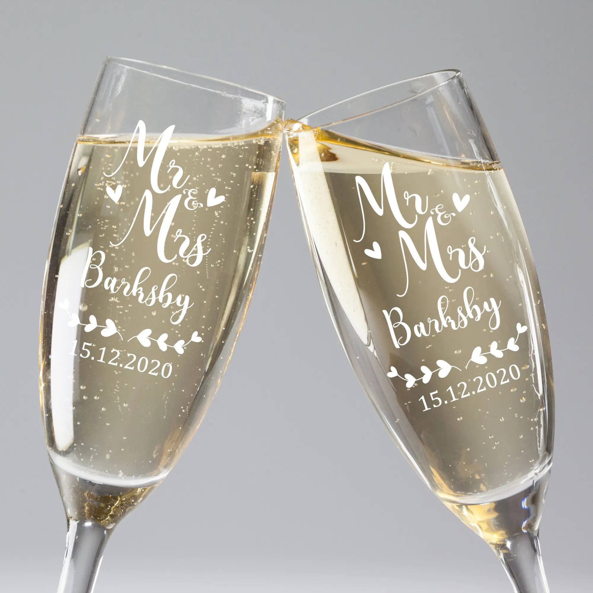 Personalized sparkling wine glasses with custom name engraving