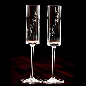 Personalized wedding champagne flutes with laser engraved names and tall elegant design