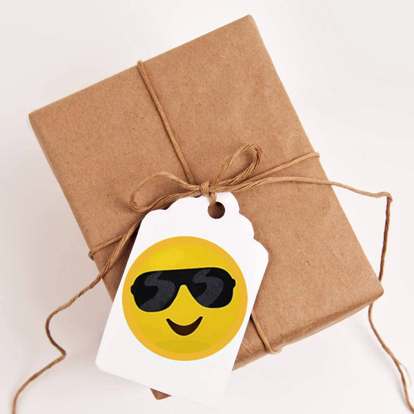 Close up of round 1 inch smiley face stickers made from high quality paper with bright print