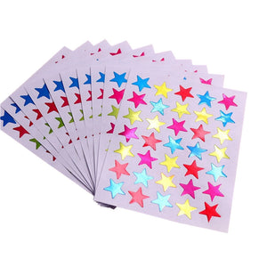 Close-up of star award stickers showing bright colors and durable PVC material