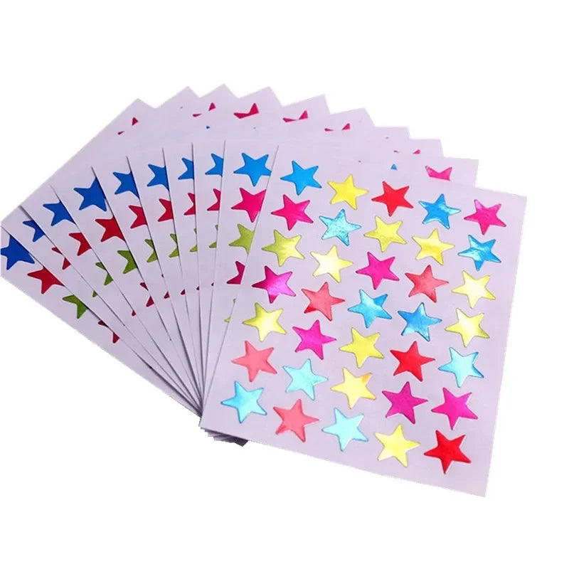 Star reward stickers placed on kids homework notebooks to encourage effort and learning