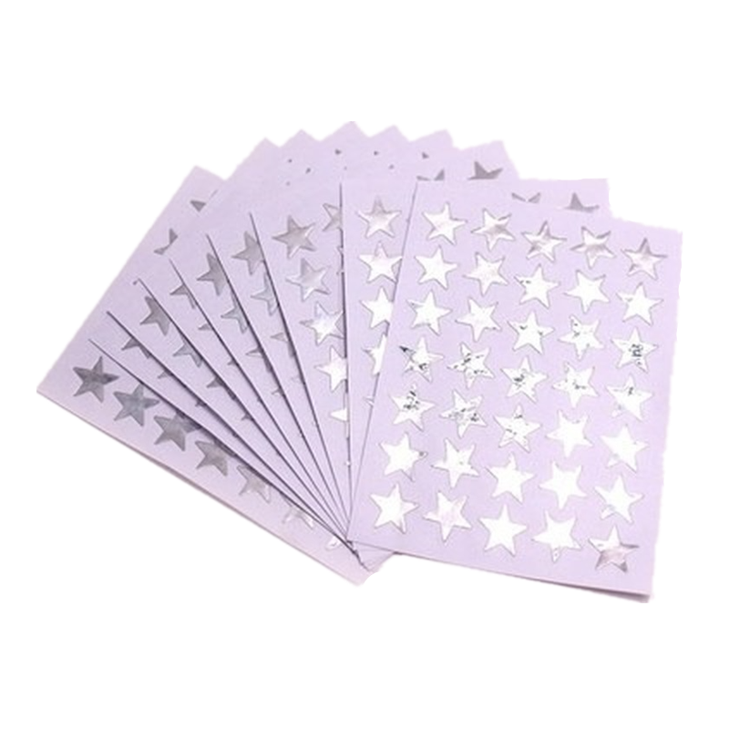 Star stickers applied on a kids behaviour chart to encourage good habits and learning