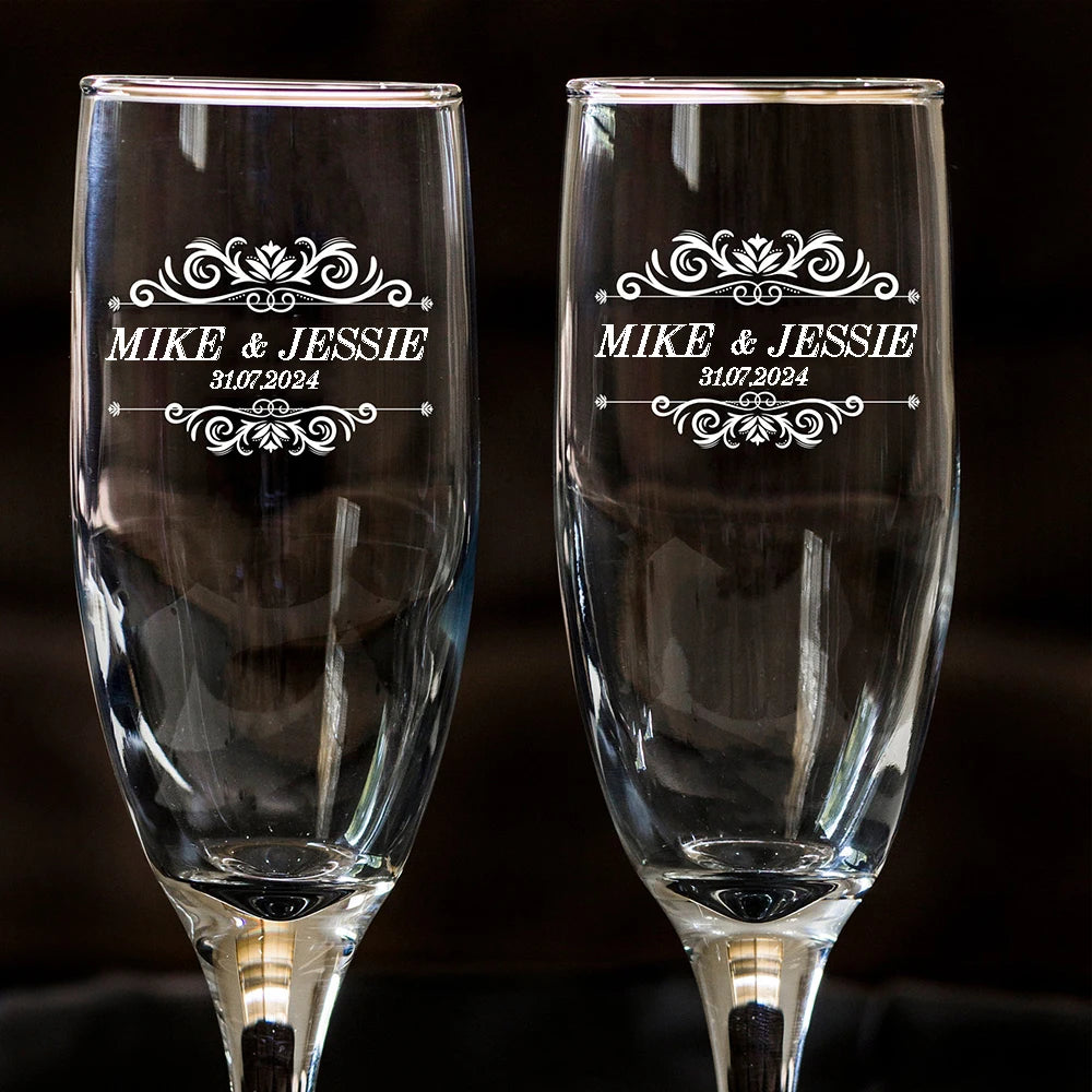 Personalized wedding champagne glasses with engraved couple names
