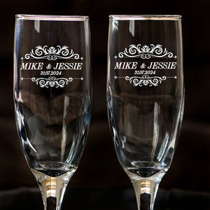 Personalized wedding champagne glasses with engraved couple names