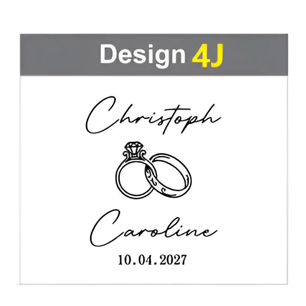 Personalized champagne glasses displayed at wedding reception table