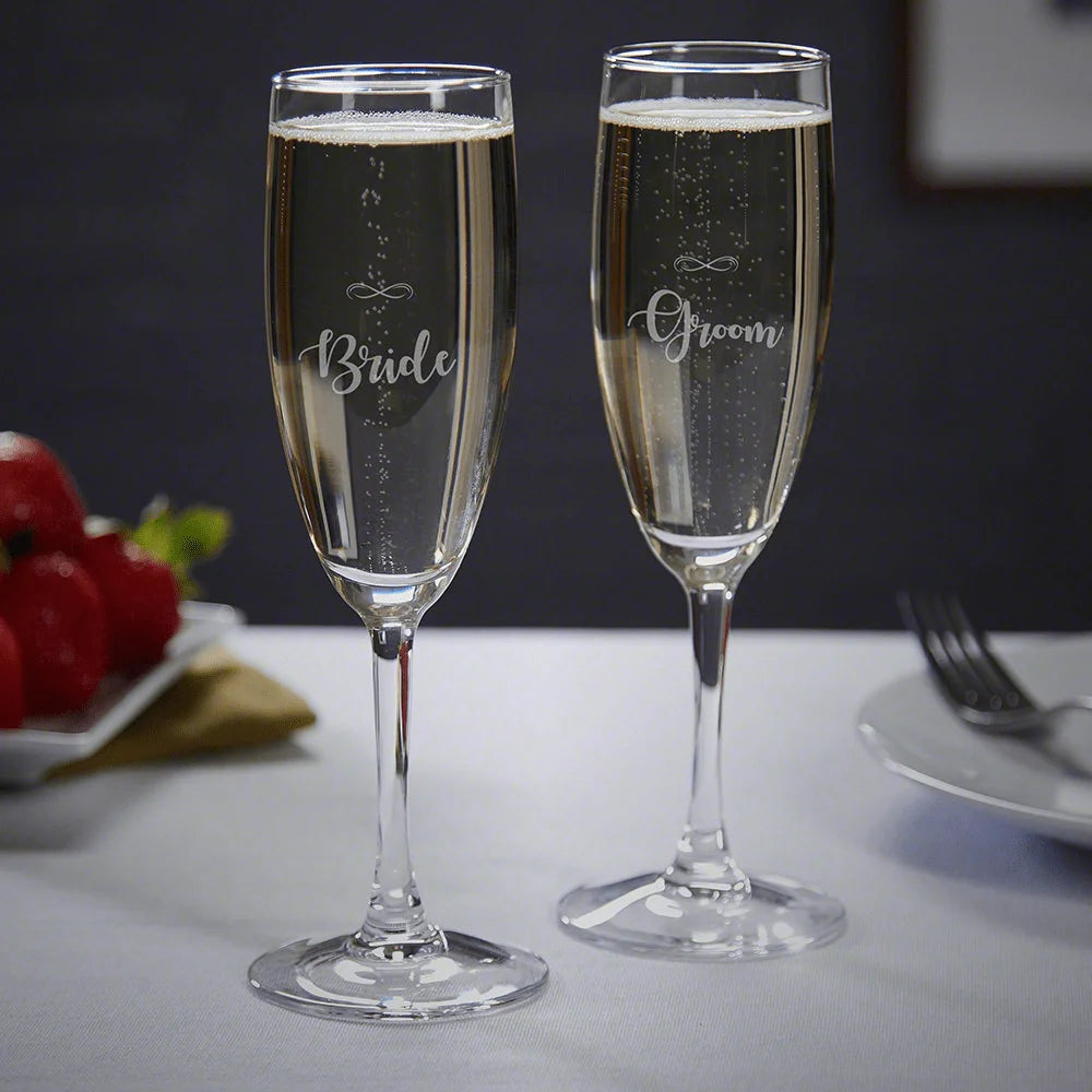 Laser engraved champagne flutes made from clear premium glass