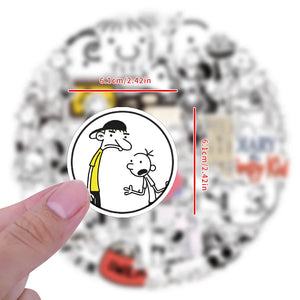 Hand holding a wimpy style cartoon sticker showing size dimensions of 6.1 cm on white background